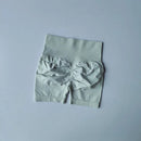 Shorts esportivos de levantamento de quadril pêssego