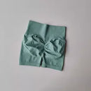 Shorts esportivos de levantamento de quadril pêssego