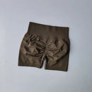 Shorts esportivos de levantamento de quadril pêssego