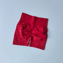 Shorts esportivos de levantamento de quadril pêssego